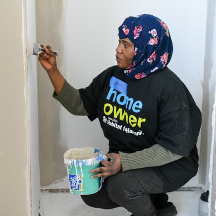 Habitat homeowner painting