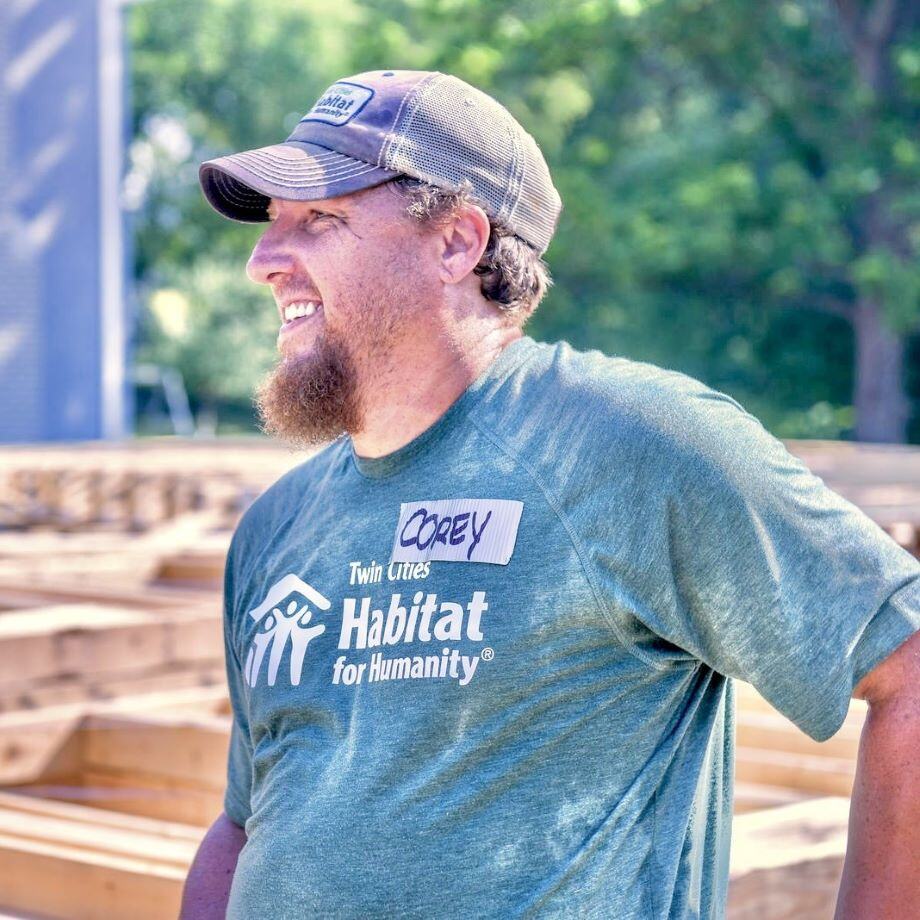 Corey smiling on site.